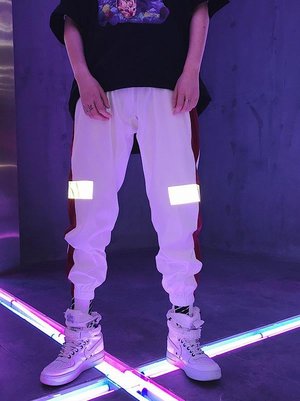 Pantalones hip-hop para hombre con efecto reflectante.