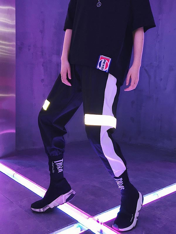 Pantalones hip-hop para hombre con efecto reflectante.