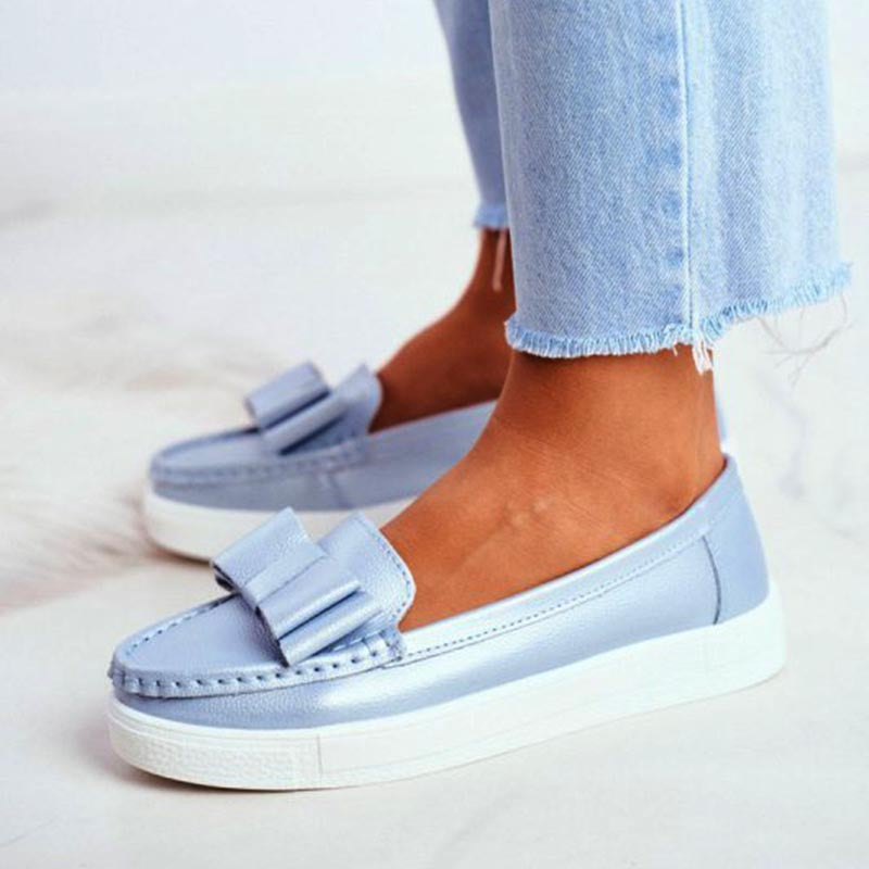 Zapatos casuales con suelas suaves y tacones planos para mujeres durante toda la temporada.