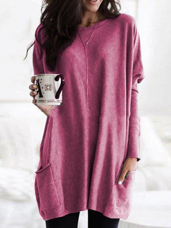 Camisa de mujer con cuello redondo y manga larga.