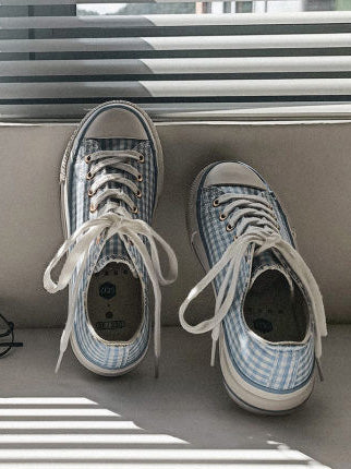 Zapatos de lona a cuadros azul oscuro