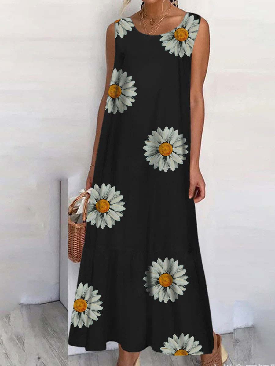 Un pequeño vestido sin mangas con un patrón de manzanilla.