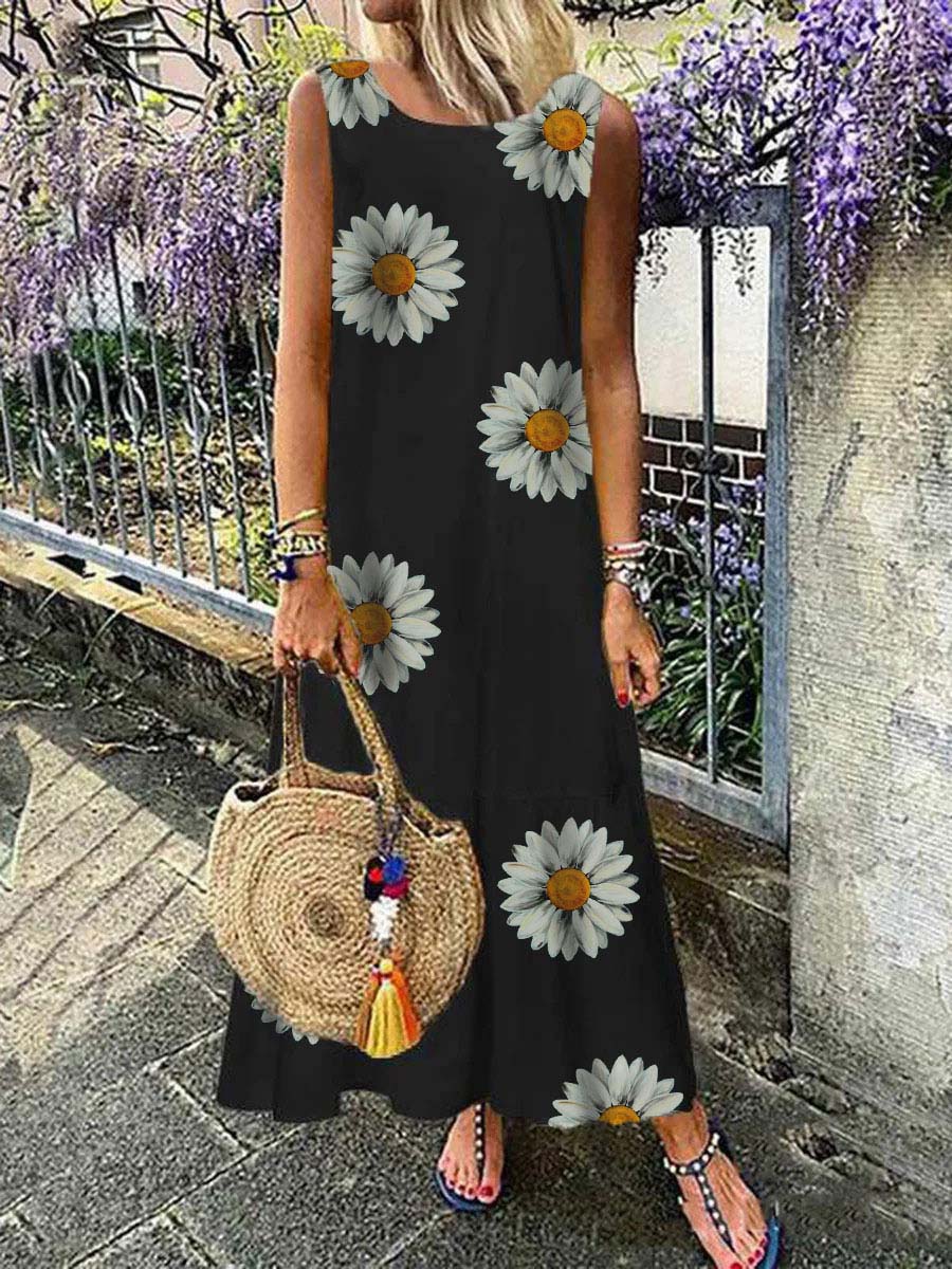 Un pequeño vestido sin mangas con un patrón de manzanilla.