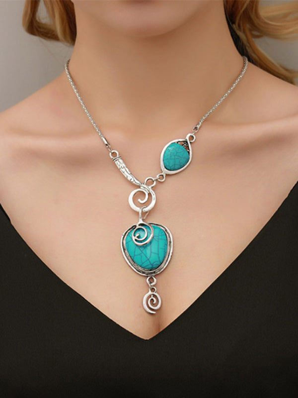 El viento étnico de las mujeres rompió el collar turquesa