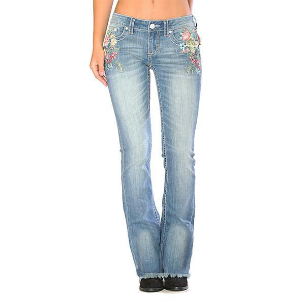 Jeans florales bordados, pirateados y elásticos