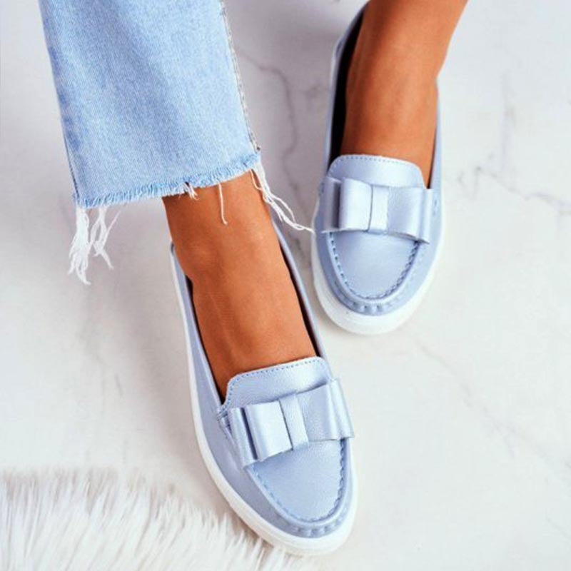 Zapatos casuales con suelas suaves y tacones planos para mujeres durante toda la temporada.