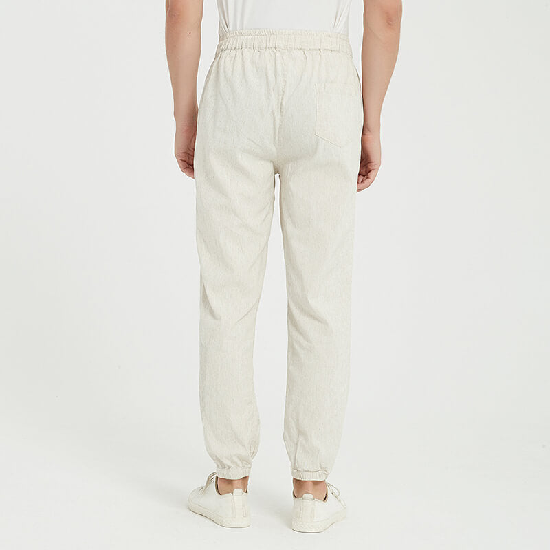 Pantalones de verano ligeros, transpirables, sueltos y elásticos para hombre hechos de lino natural