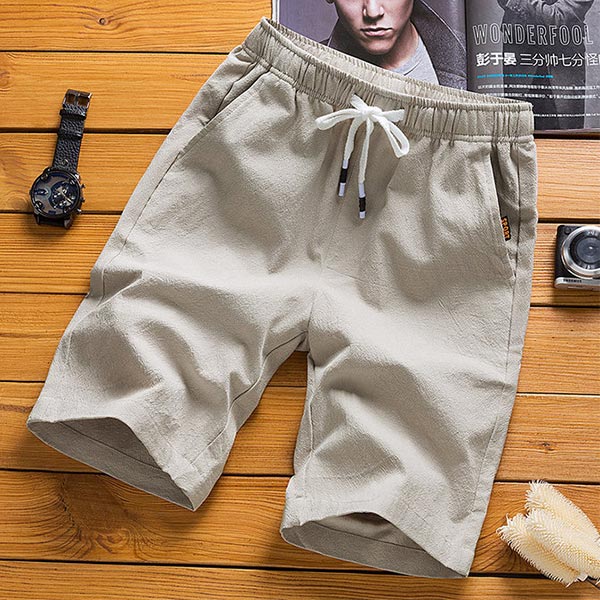 Shorts casuales, sueltos y transpirables de algodón y lino para hombres.