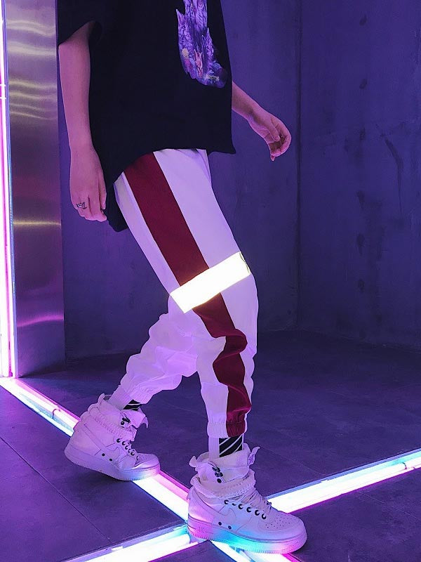 Pantalones hip-hop para hombre con efecto reflectante.