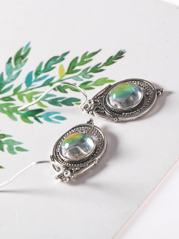 Pendientes de mujer hechos de piedras lunares