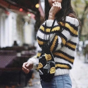 Suéter vintage de mohair a rayas con cuello oblicuo y manga farol