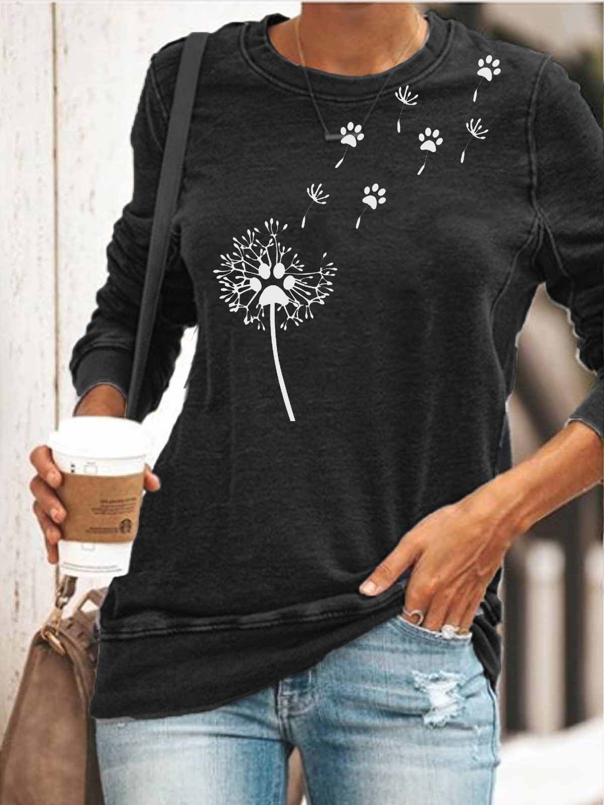 Kūrybingo dizaino viršus su kiaulpienės letena