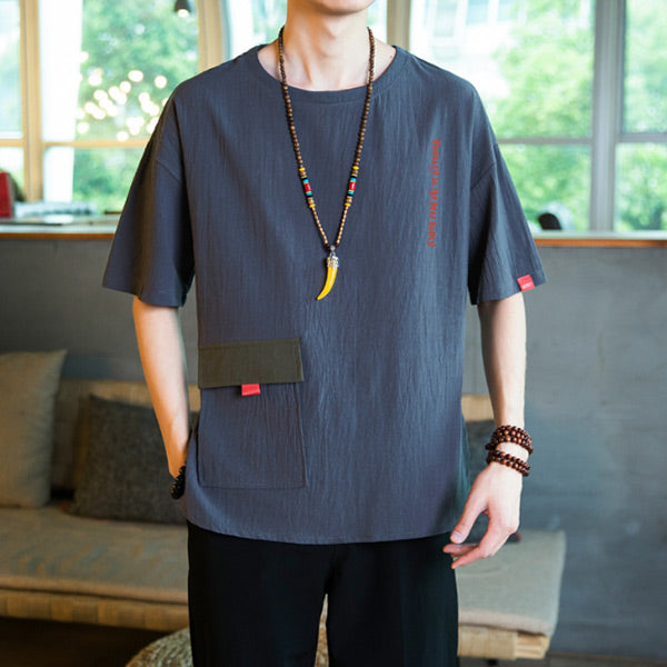 Camisa de algodón y lino para hombres con cuello redondo y bolsillo suelto.