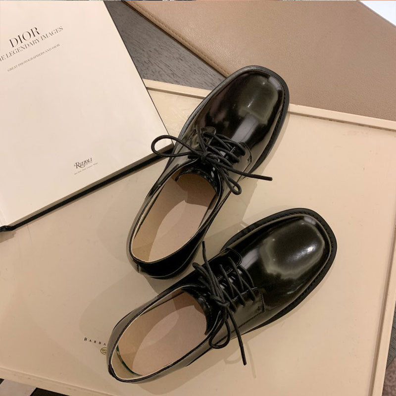 Zapatos derby de cuero negro