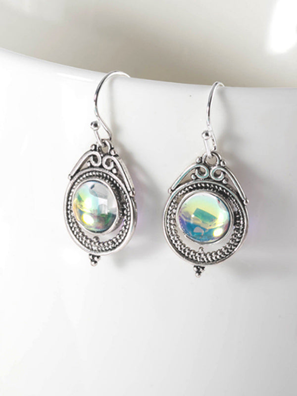 Pendientes de mujer hechos de piedras lunares