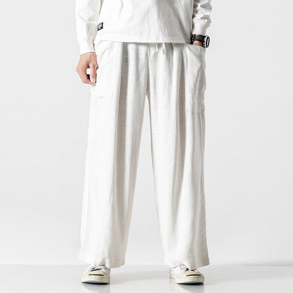 Bolsillos de lino de algodón retro para hombres con bragas sueltas y anchas