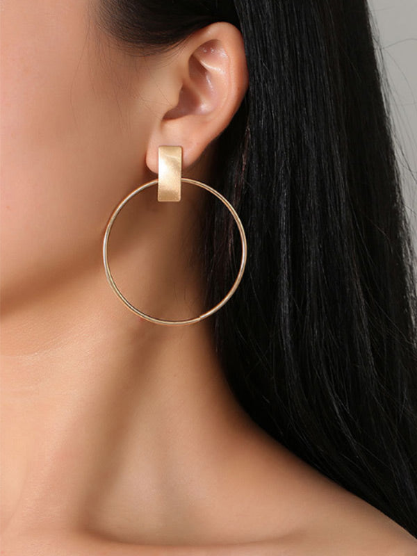 Pendientes redondos simples de metal para mujer