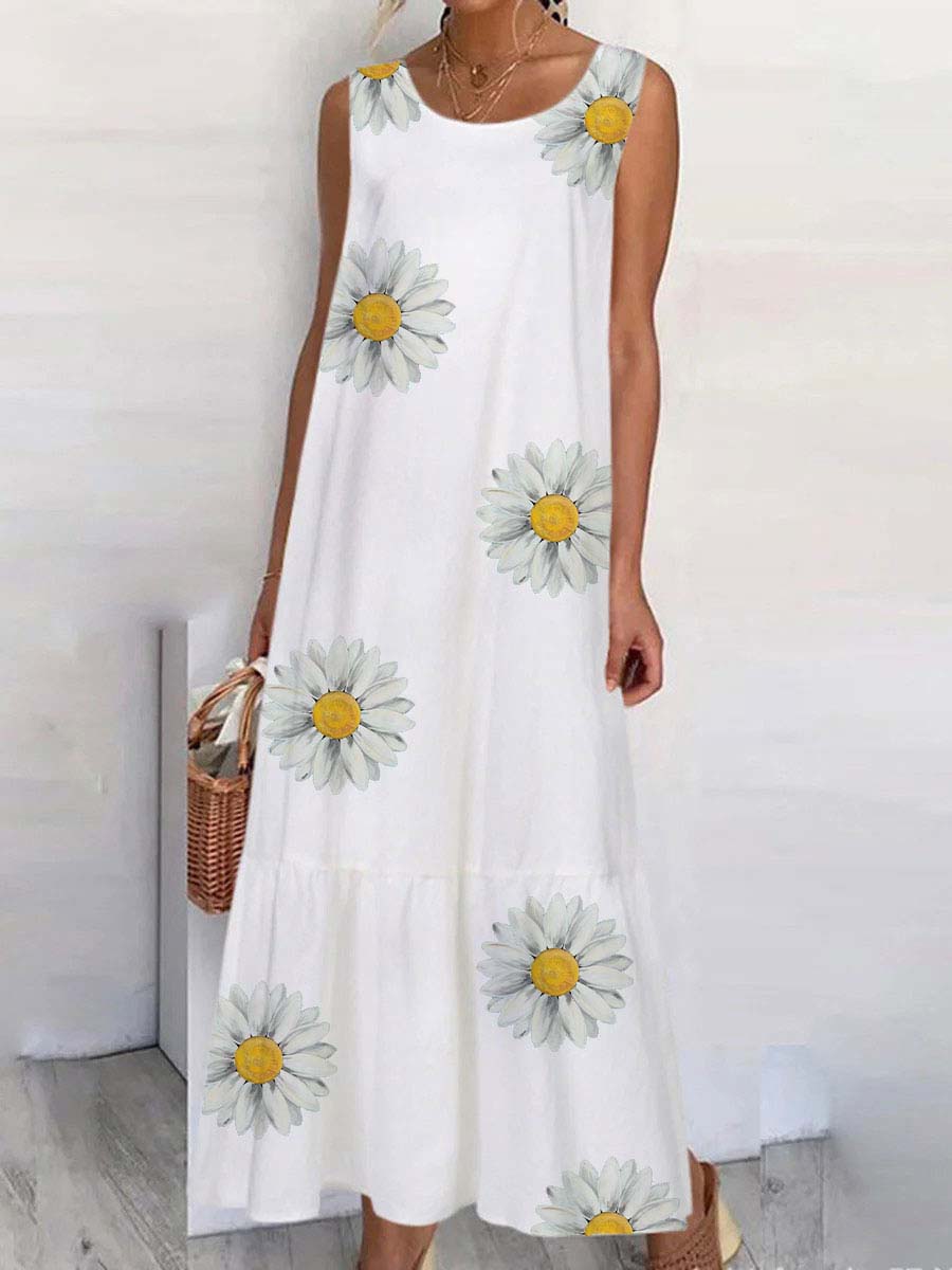 Un pequeño vestido sin mangas con un patrón de manzanilla.