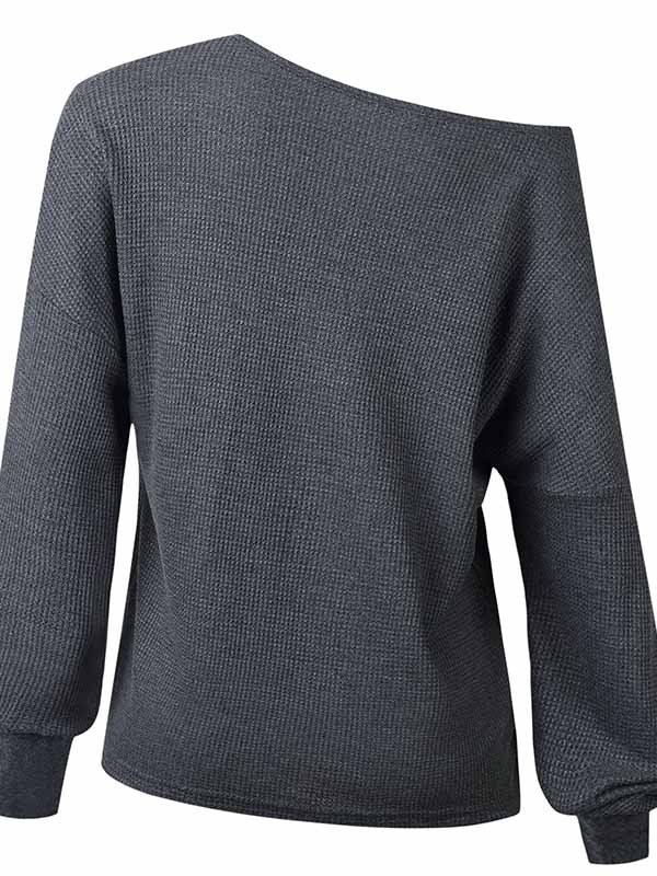 Blusa con cuello de pico y manga larga.