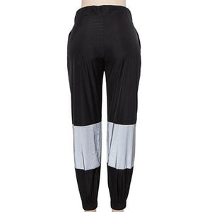 Pantalón reflectante con cremallera Nyma