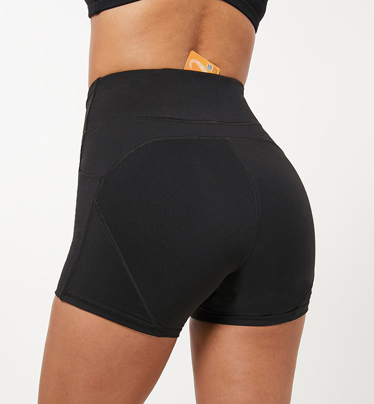 Pantalones cortos de yoga ajustados y elásticos de bolsillo