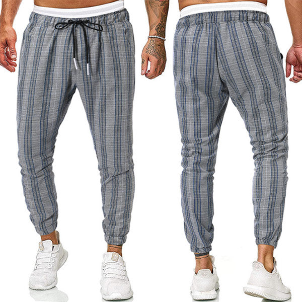 Pantalones simples con un estiramiento a cuadros para hombres grandes