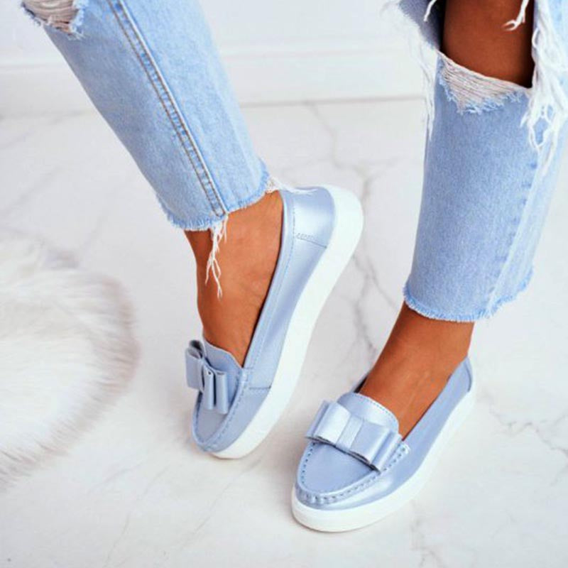 Zapatos casuales con suelas suaves y tacones planos para mujeres durante toda la temporada.