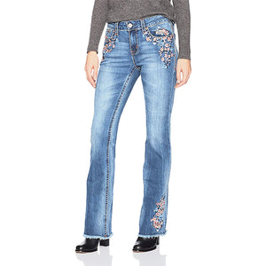 Jeans florales bordados, pirateados y elásticos