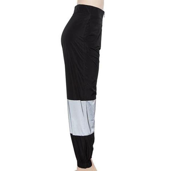 Pantalón reflectante con cremallera Nyma