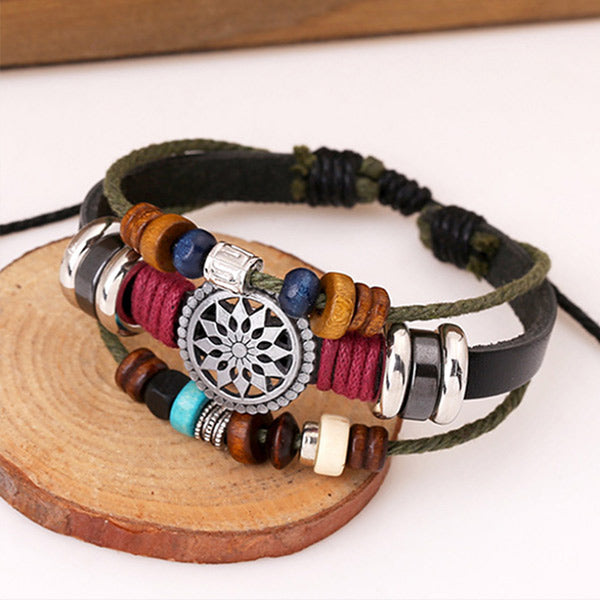 Pulsera de aluminio hecha de piel de vaca antigua, con cuentas.