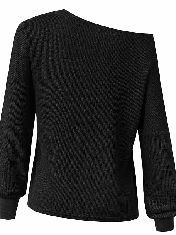 Blusa con cuello de pico y manga larga.