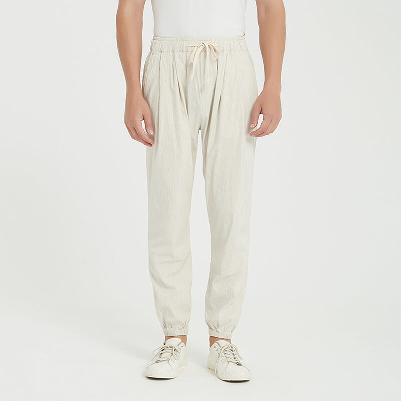 Pantalones de verano ligeros, transpirables, sueltos y elásticos para hombre hechos de lino natural