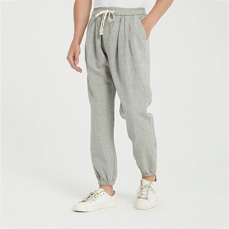 Pantalones de verano ligeros, transpirables, sueltos y elásticos para hombre hechos de lino natural