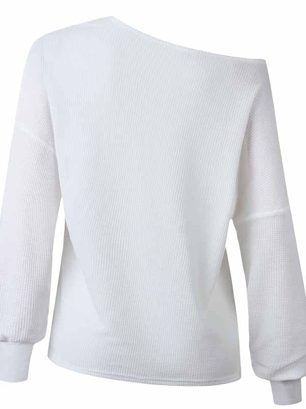 Blusa con cuello de pico y manga larga.