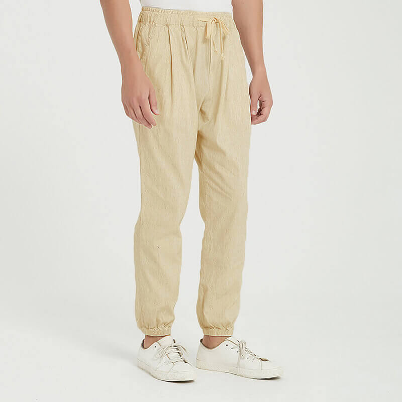 Pantalones de verano ligeros, transpirables, sueltos y elásticos para hombre hechos de lino natural
