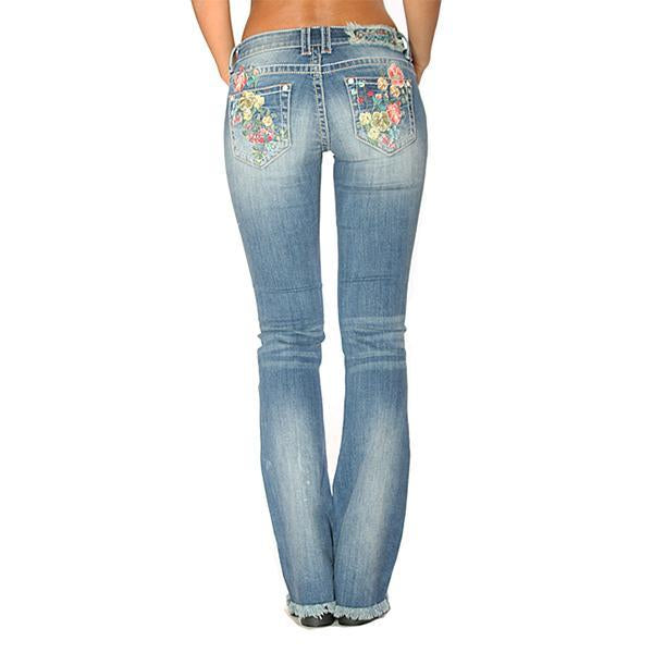 Jeans florales bordados, pirateados y elásticos