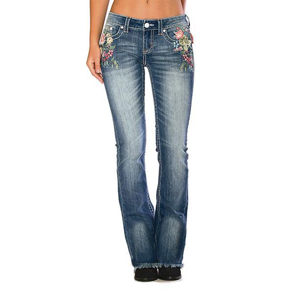 Jeans florales bordados, pirateados y elásticos