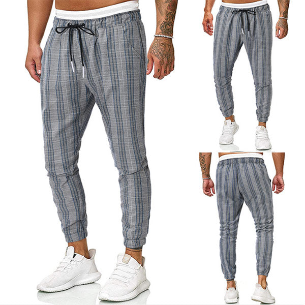 Pantalones simples con un estiramiento a cuadros para hombres grandes