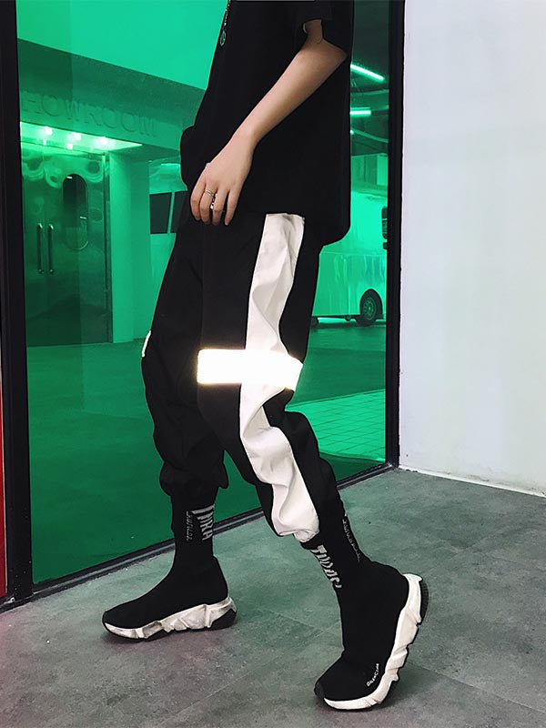 Pantalones hip-hop para hombre con efecto reflectante.