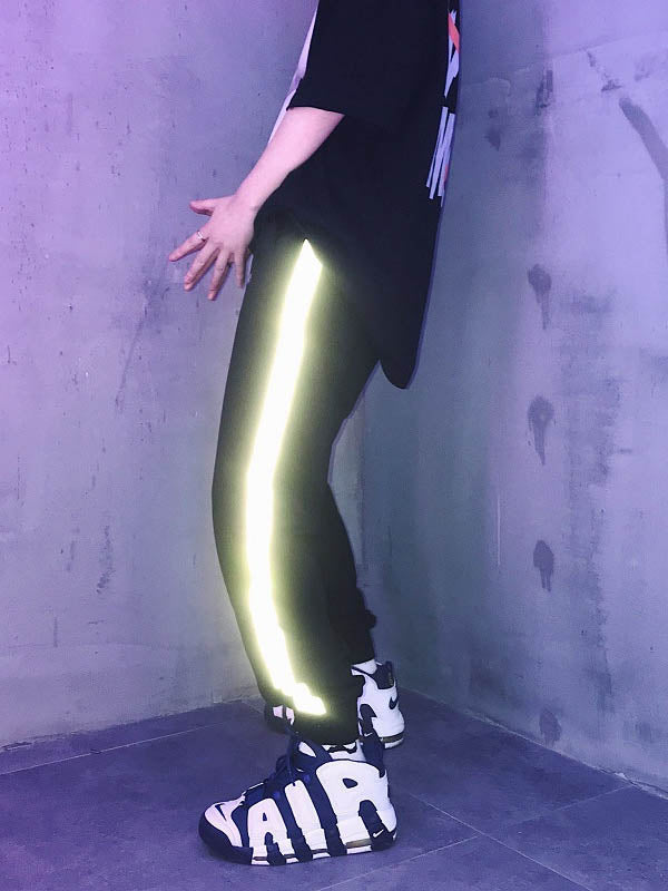 Pantalones hip-hop para hombre con efecto reflectante.