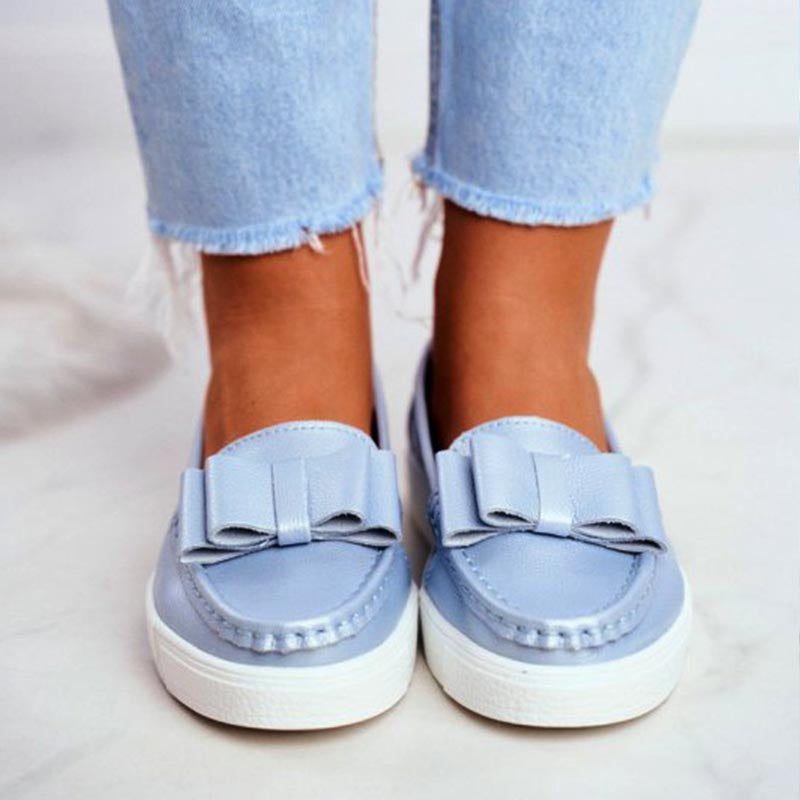 Zapatos casuales con suelas suaves y tacones planos para mujeres durante toda la temporada.