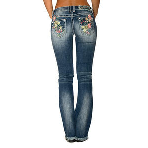 Jeans florales bordados, pirateados y elásticos