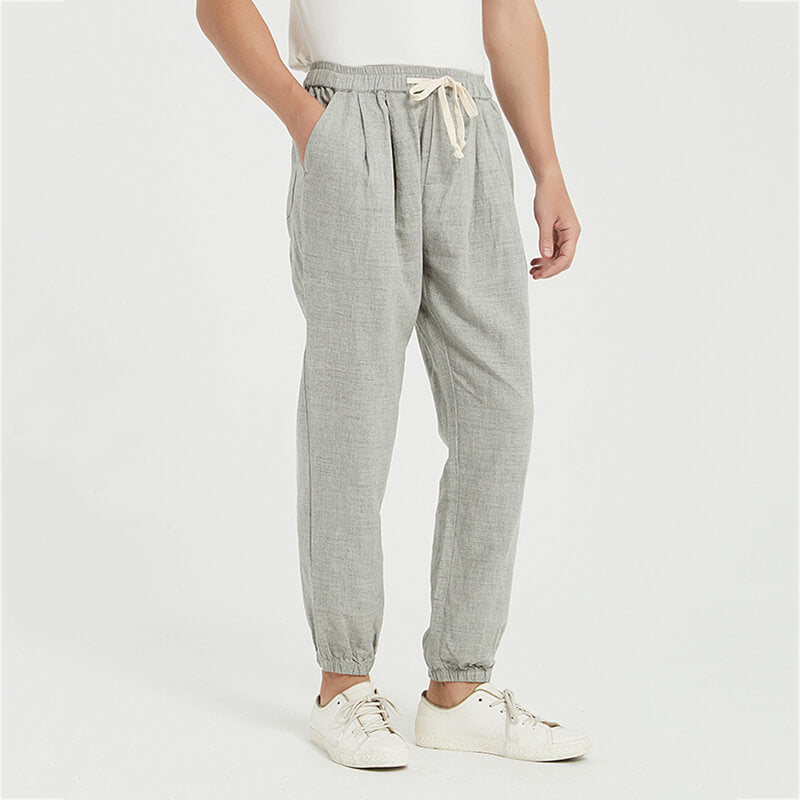 Pantalones de verano ligeros, transpirables, sueltos y elásticos para hombre hechos de lino natural