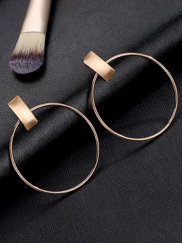 Pendientes redondos simples de metal para mujer