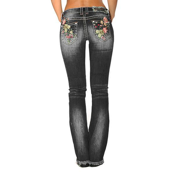Jeans florales bordados, pirateados y elásticos