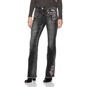 Jeans florales bordados, pirateados y elásticos