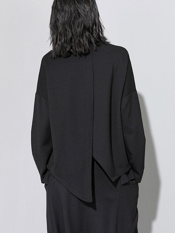 Camisa de mujer de manga larga con bolsillo de cuero.