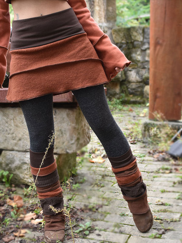 Las mujeres de los años 80, el sexo justo, cosía pantalones cálidos, leggings y una falda de tres piezas