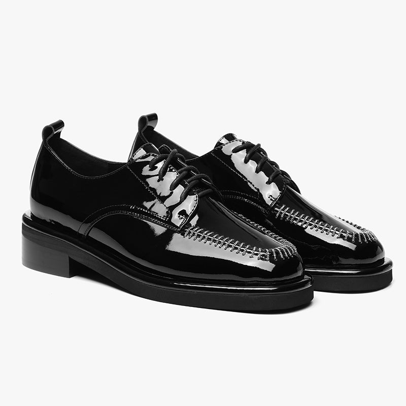 Patent Oxfords in Schwarz / Braun