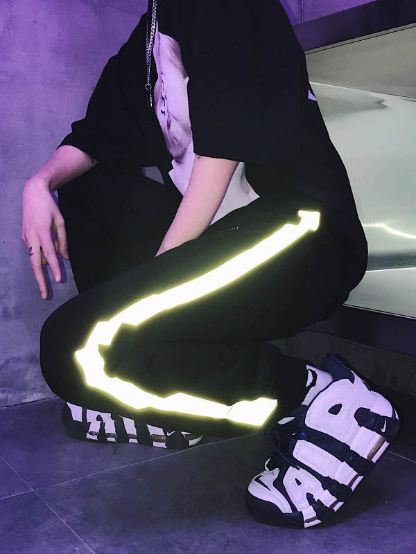 Pantalones hip-hop para hombre con efecto reflectante.